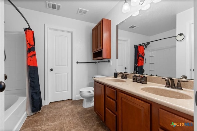 9108 Sage Loop Ct, Temple, TX 76502 - full bathroom featuring double vanity, shower / bath combo, toilet, and tile patterned floors