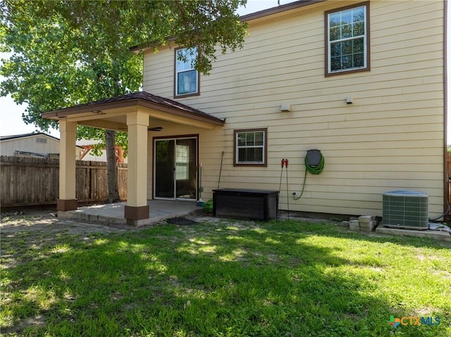 9108 Sage Loop Ct, Temple, TX 76502 - rear view of house with cooling unit and a patio