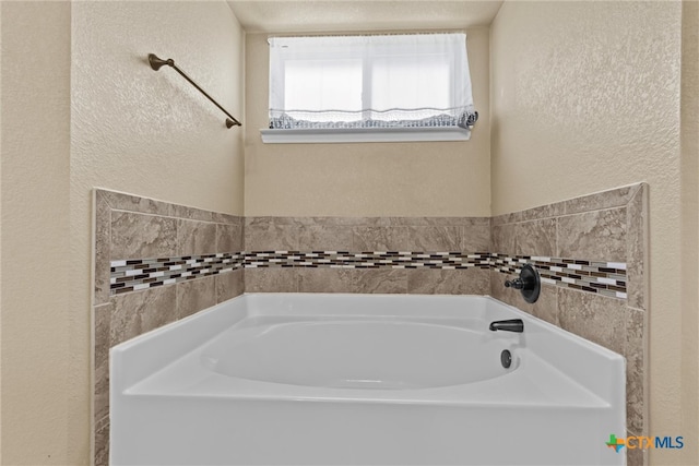 bathroom featuring a bathing tub