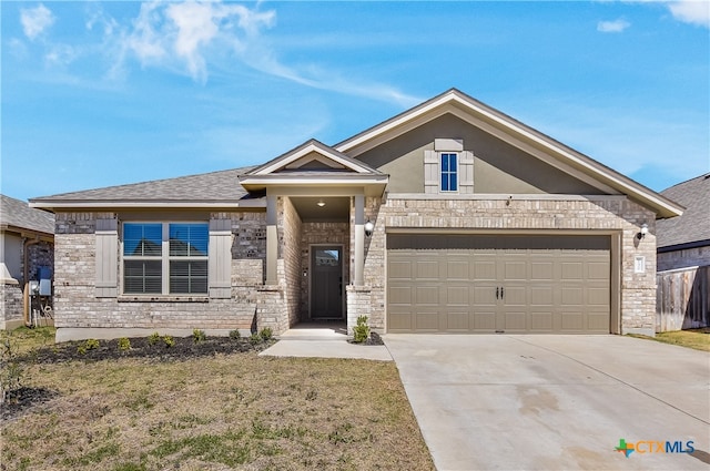 view of front of home featuring brick siding, stucco siding, an attached garage, and driveway