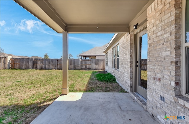 132 Periwinkle Ln, Bastrop, TX 78602 - view of patio / terrace with a fenced backyard