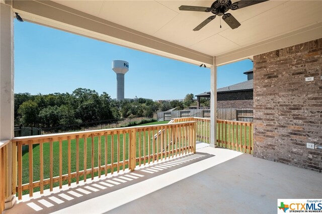 view of patio with ceiling fan