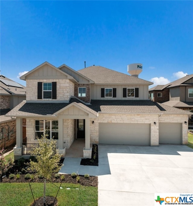 view of front of property featuring a garage