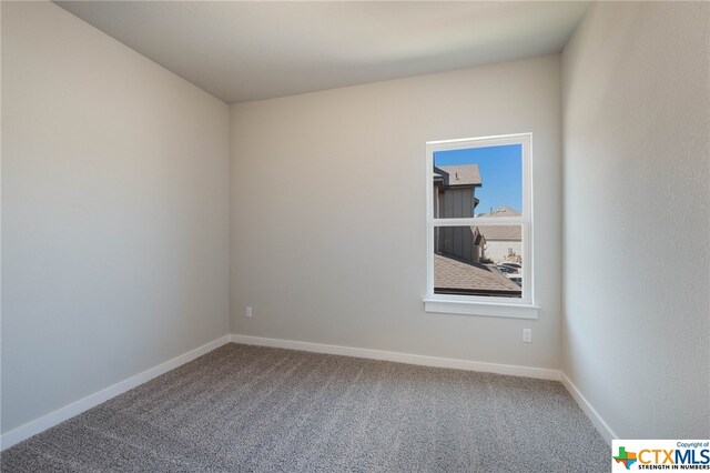 view of carpeted spare room