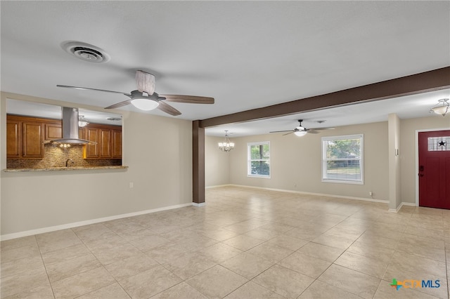 unfurnished living room with light tile patterned flooring, ceiling fan with notable chandelier, and beam ceiling