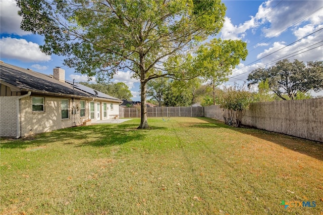 view of yard with a patio area