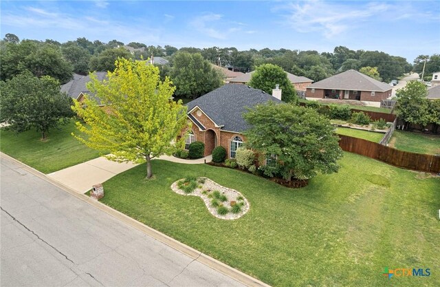 2105 Yak Trl, Harker Heights, TX 76548 - view of front facade with a chimney, a residential view, and brick siding