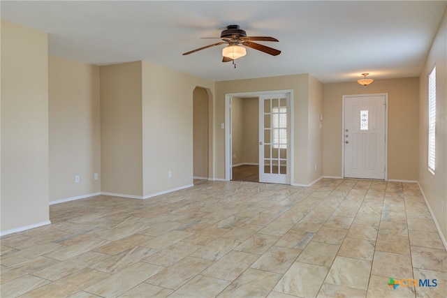 entryway featuring ceiling fan