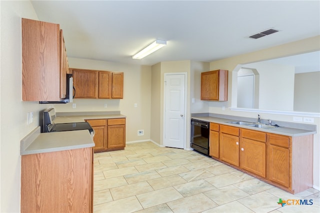 kitchen with sink and black appliances