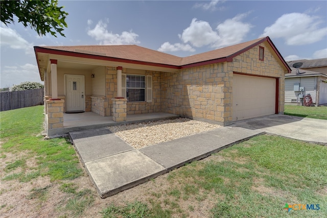 ranch-style house with a front yard and a garage