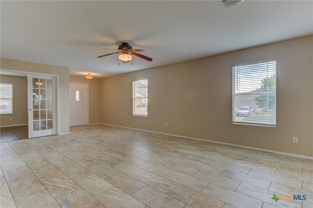 empty room featuring ceiling fan