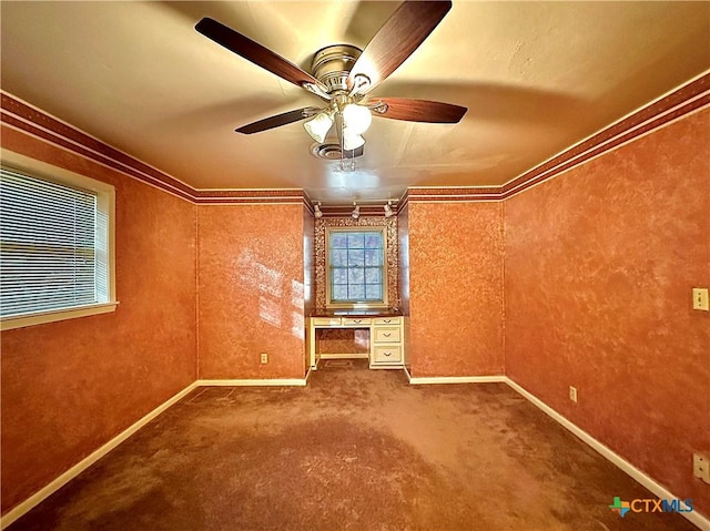 203 Hampshire St, Victoria, TX 77904 - empty room featuring ornamental molding, carpet, baseboards, and ceiling fan