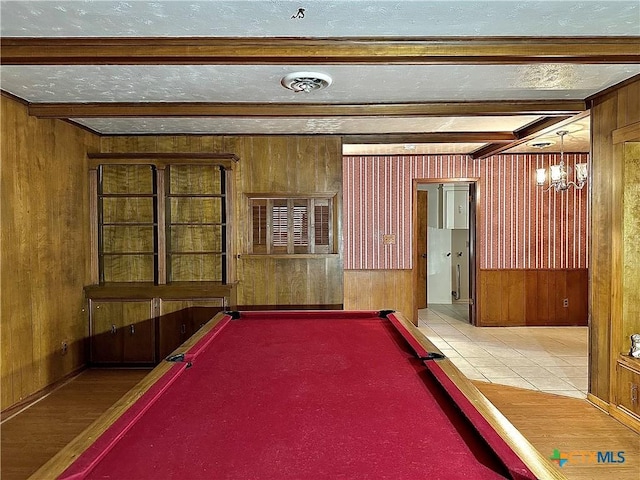 203 Hampshire St, Victoria, TX 77904 - game room featuring wood walls, billiards table, a textured ceiling, and beam ceiling