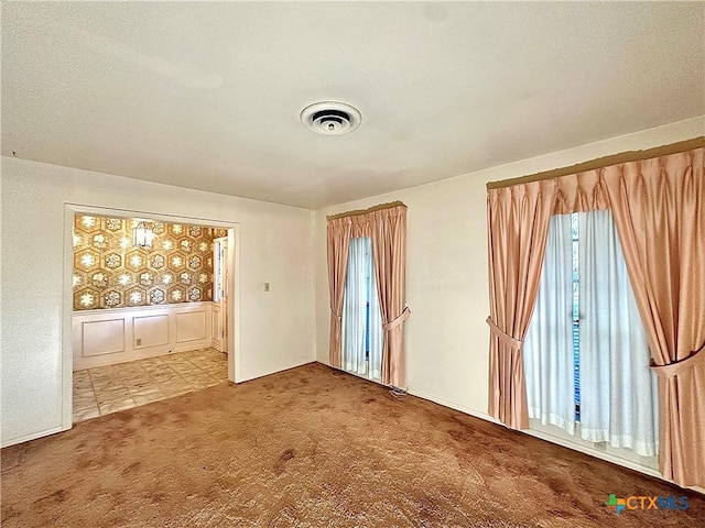 203 Hampshire St, Victoria, TX 77904 - spare room featuring carpet flooring