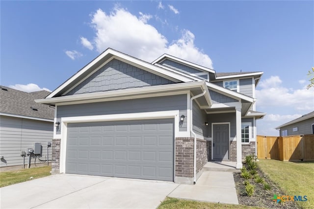 craftsman inspired home featuring a garage