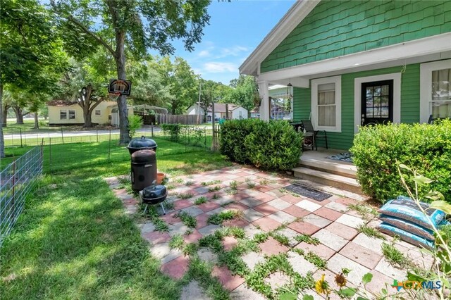 304 W Putnam, Ganado, TX 77962 - view of yard with covered porch