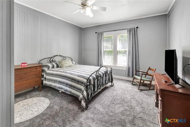 304 W Putnam, Ganado, TX 77962 - bedroom with crown molding, carpet, and ceiling fan