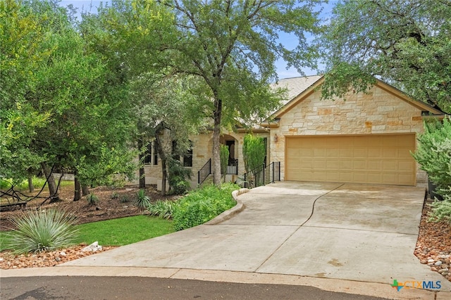 view of front of property featuring a garage