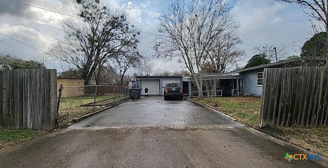 view of front of property with a garage