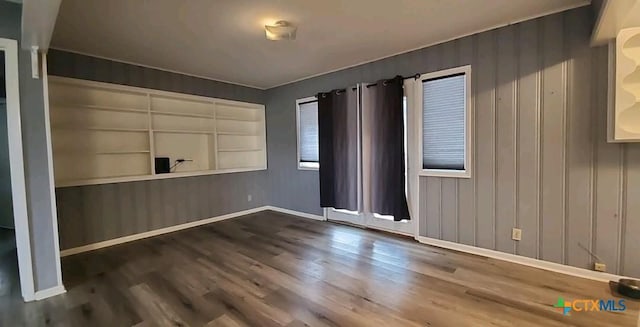 empty room featuring hardwood / wood-style floors