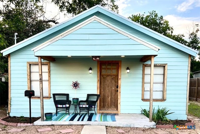 747 Oasis St, New Braunfels, TX 78130 - view of front of property with covered porch and fence