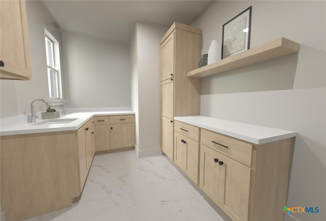 kitchen with light brown cabinets and sink