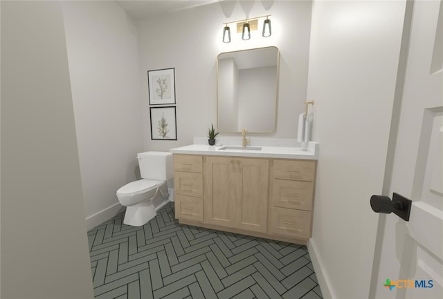 bathroom with tile patterned floors, vanity, and toilet