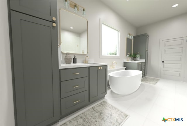 bathroom featuring a bath, vanity, and tile patterned floors