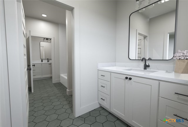 bathroom featuring tile patterned floors and vanity