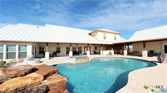 158 Sendera Loop, Victoria, TX 77904 - view of swimming pool with a patio, ceiling fan, a pool with connected hot tub, and an outdoor bar
