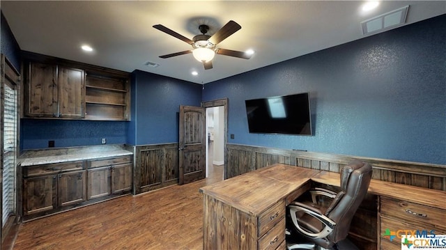 158 Sendera Loop, Victoria, TX 77904 - office featuring ceiling fan, a textured wall, dark wood-type flooring, recessed lighting, and a wainscoted wall