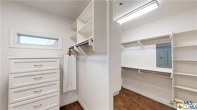 158 Sendera Loop, Victoria, TX 77904 - spacious closet with electric panel and dark wood-style floors