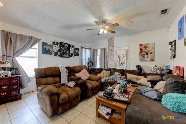 2201 Tracey Ann Ln, Killeen, TX 76543 - living room with plenty of natural light, a ceiling fan, light tile patterned floors, and a textured ceiling