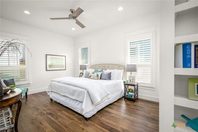 bedroom with recessed lighting, multiple windows, and wood finished floors