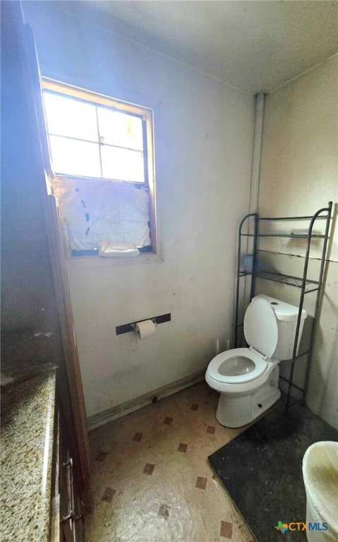 bathroom featuring toilet