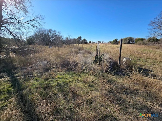 exterior space with a rural view