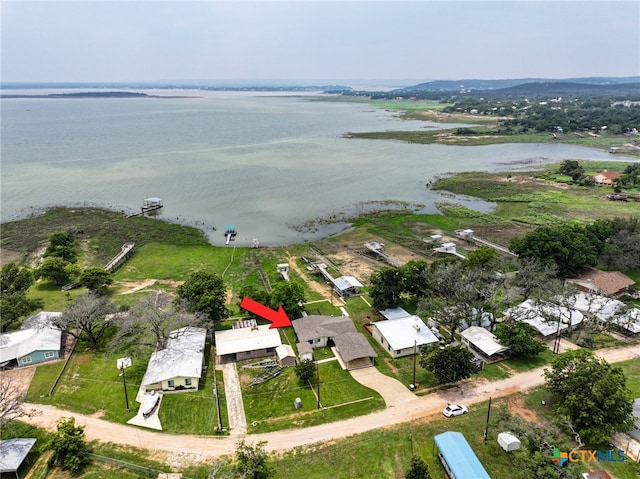 drone / aerial view featuring a water view