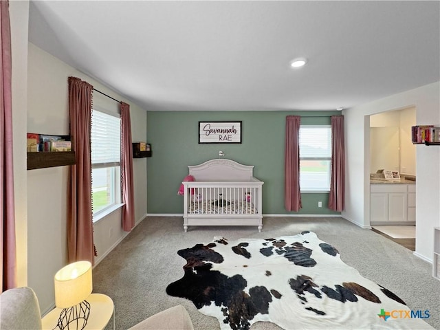 327 Steele Way, Cibolo, TX 78108 - carpeted bedroom featuring baseboards and connected bathroom