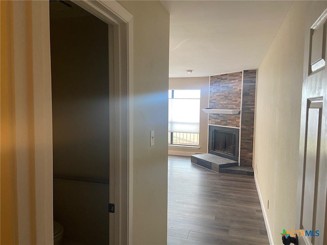 116 Campbell Dr Unit 9, Canyon Lake, TX 78133 - corridor featuring dark wood-style floors and baseboards