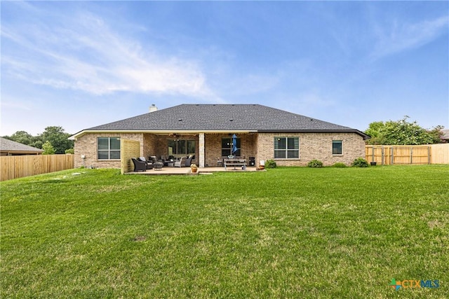 965 Ridgeoak Dr, Belton, TX 76513 - back of house featuring outdoor lounge area, a patio, a fenced backyard, and brick siding