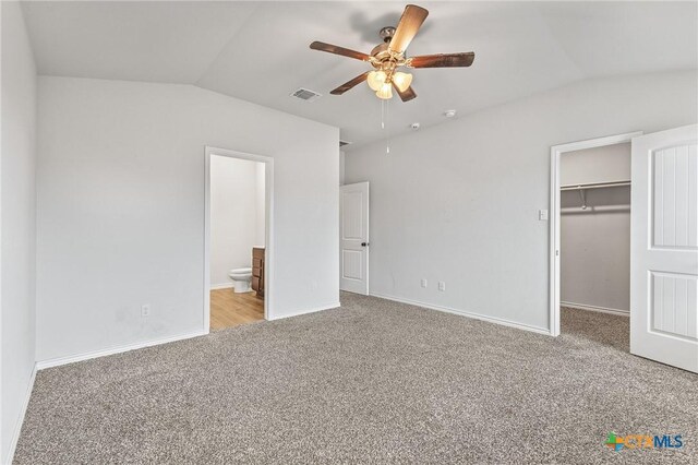 5836 Copano Rd, Belton, TX 76513 - unfurnished bedroom featuring lofted ceiling, carpet floors, a spacious closet, a closet, and ceiling fan
