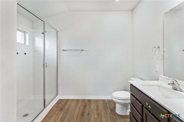 5836 Copano Rd, Belton, TX 76513 - full bath with a stall shower, wood finished floors, vanity, and vaulted ceiling