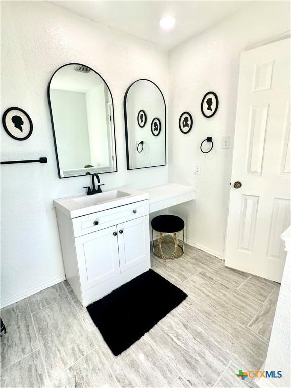 bathroom featuring vanity