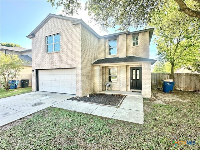 view of front property with a garage and a porch