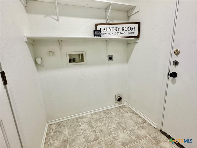 clothes washing area featuring gas dryer hookup, washer hookup, and hookup for an electric dryer