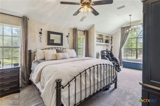 514 Duncan Dr, San Marcos, TX 78666 - bedroom featuring carpet floors, multiple windows, vaulted ceiling, and ceiling fan