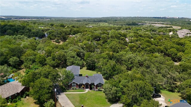 514 Duncan Dr, San Marcos, TX 78666 - view from above of property with a heavily wooded area