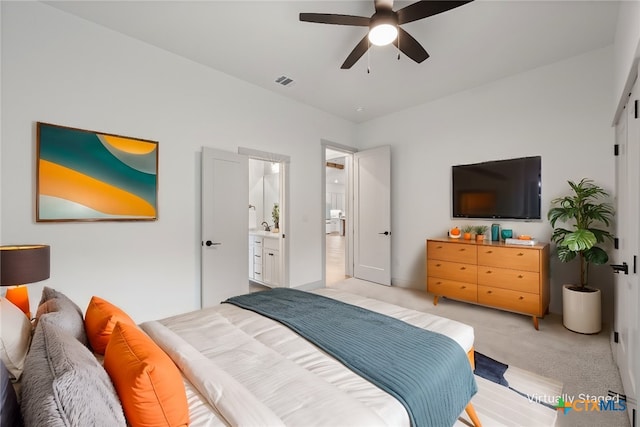 bedroom featuring a ceiling fan, light carpet, and visible vents