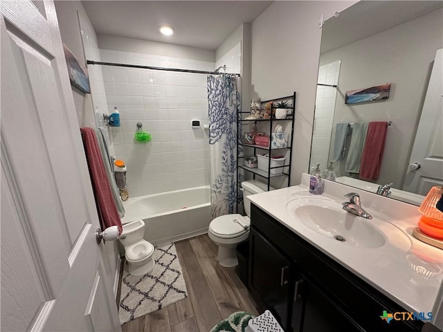 1036 Chambray Dr, Troy, TX 76579 - bathroom featuring wood finished floors, vanity, and shower / tub combo with curtain