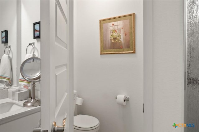 128 Riverhill Dr, Georgetown, TX 78628 - bathroom featuring toilet and vanity